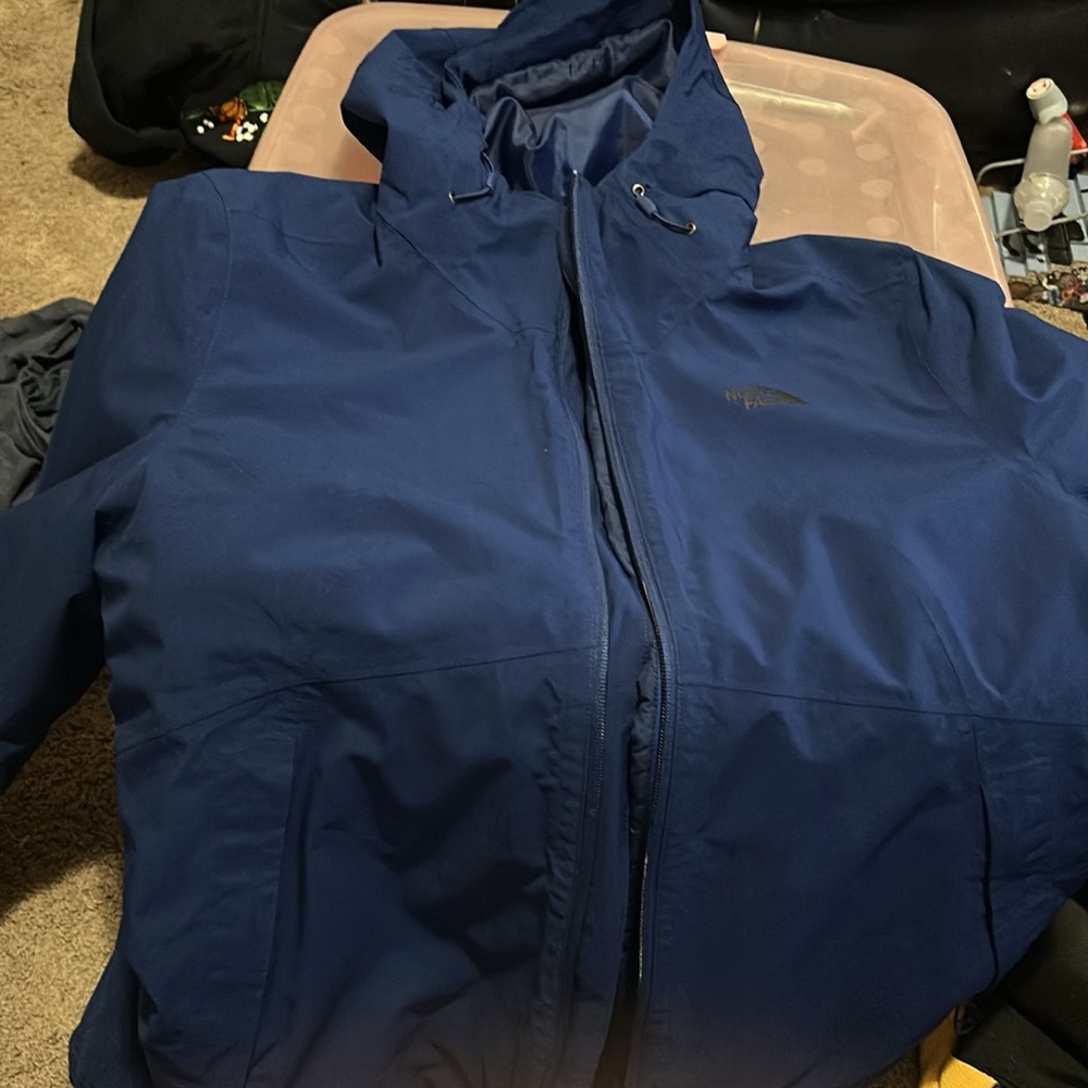 The North Face Woman’s blue winter coat